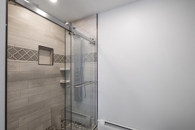 51 Bridge St, Belfast, ME 04915 - bathroom featuring a stall shower and a baseboard heating unit