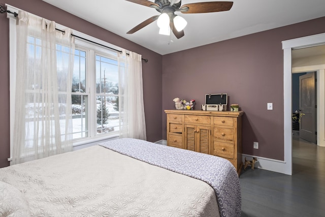 51 Bridge St, Belfast, ME 04915 - bedroom with baseboards, ceiling fan, and wood finished floors