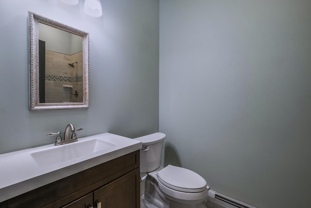 51 Bridge St, Belfast, ME 04915 - full bathroom with toilet, tiled shower, baseboard heating, and vanity