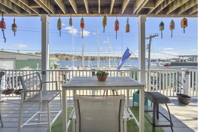 51 Bridge St, Belfast, ME 04915 - wooden terrace with a water view