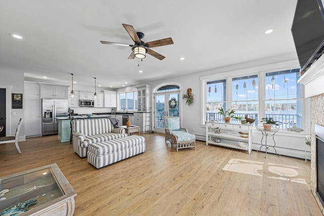 51 Bridge St, Belfast, ME 04915 - living room with recessed lighting, light wood-style flooring, and a ceiling fan