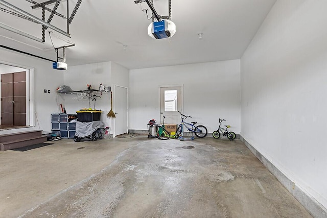 garage featuring a garage door opener