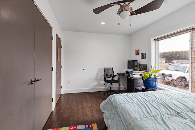 bedroom featuring ceiling fan, baseboards, wood finished floors, and recessed lighting