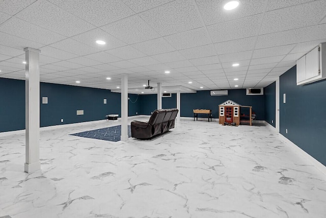 interior space featuring an AC wall unit, baseboards, marble finish floor, and recessed lighting