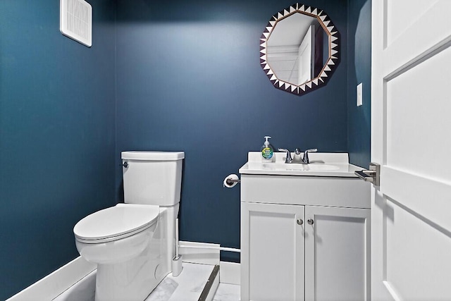 bathroom with visible vents, toilet, baseboards, and vanity
