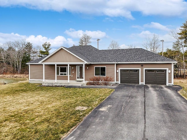 view of front of home featuring driveway, a porch, an attached garage, a shingled roof, and a front yard