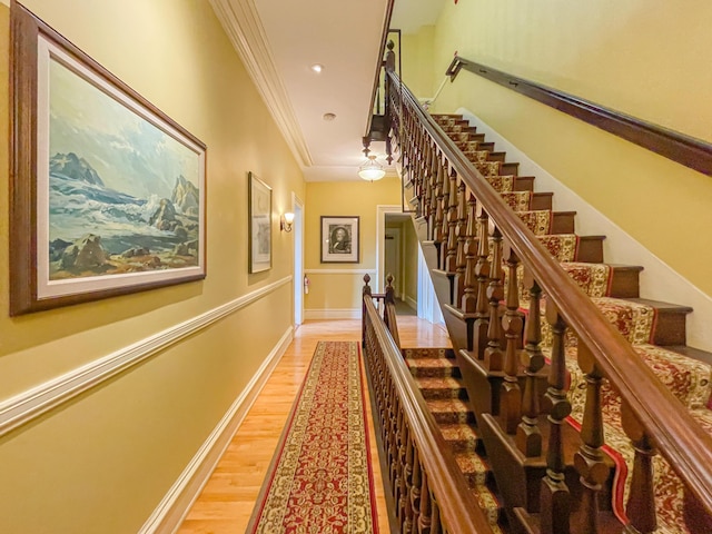 727 Congress St Unit 5, Portland, ME 04102 - stairway with recessed lighting, crown molding, baseboards, and wood finished floors