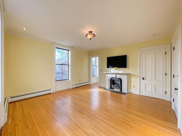 727 Congress St Unit 5, Portland, ME 04102 - unfurnished living room featuring light wood-style flooring, ornamental molding, and baseboard heating