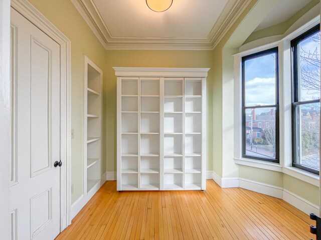 727 Congress St Unit 5, Portland, ME 04102 - unfurnished room featuring baseboards, light wood-type flooring, and crown molding