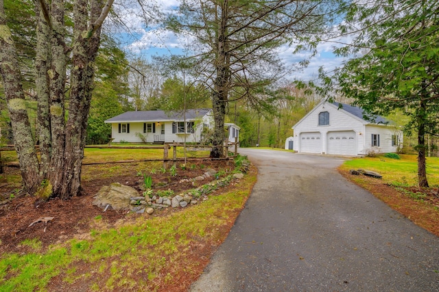 927 Pleasant St, Blue Hill, ME 04614 - ranch-style house with asphalt driveway and a front yard