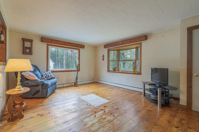 927 Pleasant St, Blue Hill, ME 04614 - unfurnished room featuring crown molding, hardwood / wood-style flooring, and baseboards