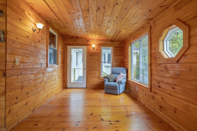 927 Pleasant St, Blue Hill, ME 04614 - unfurnished room with wood walls, light wood finished floors, and wooden ceiling