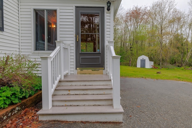 927 Pleasant St, Blue Hill, ME 04614 - doorway to property with a yard