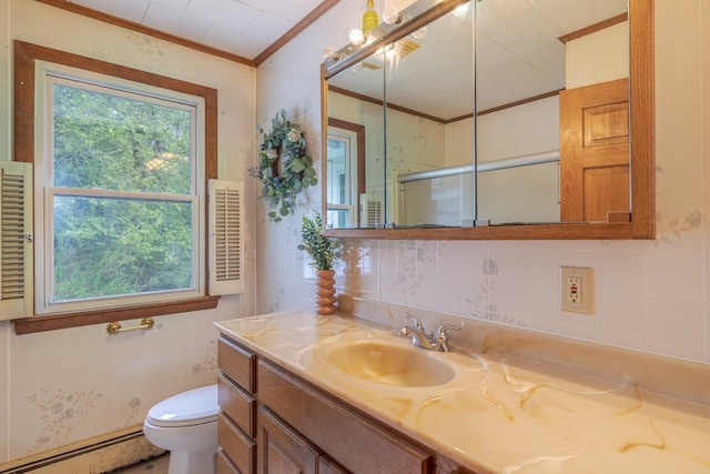 927 Pleasant St, Blue Hill, ME 04614 - full bathroom with a baseboard heating unit, ornamental molding, vanity, toilet, and backsplash