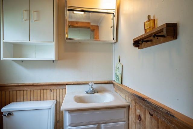 927 Pleasant St, Blue Hill, ME 04614 - half bathroom with toilet and vanity
