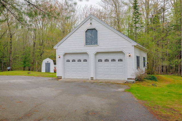 927 Pleasant St, Blue Hill, ME 04614 - garage with a detached garage and a storage unit
