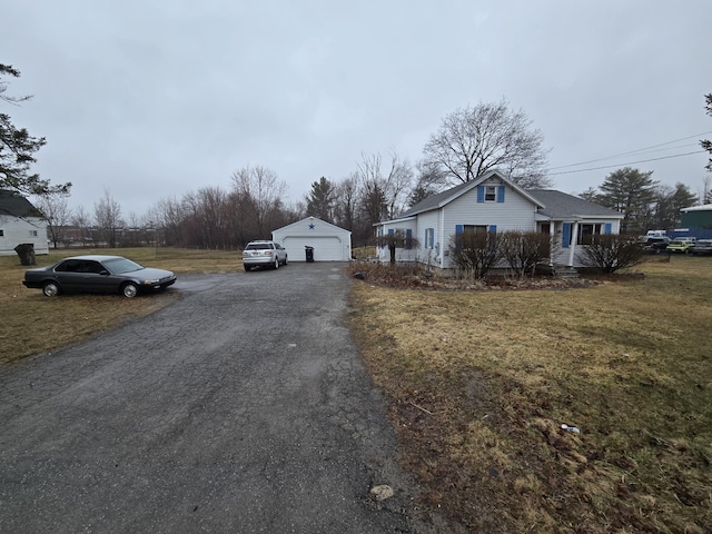 view of street featuring aphalt driveway