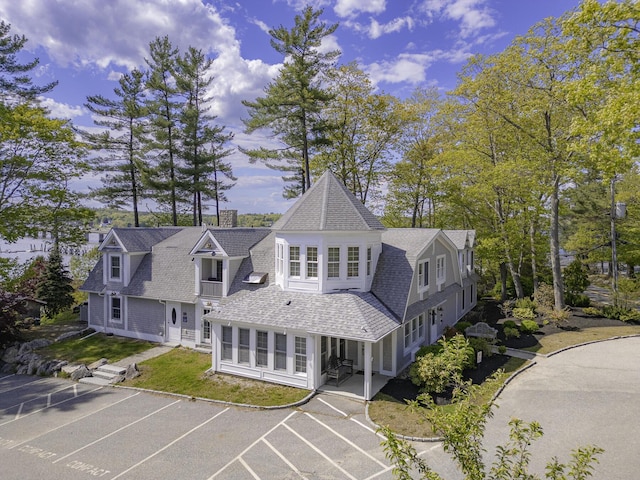 302 Eddy Rd Unit 302, Edgecomb, ME 04556 - view of front of house featuring a shingled roof and uncovered parking