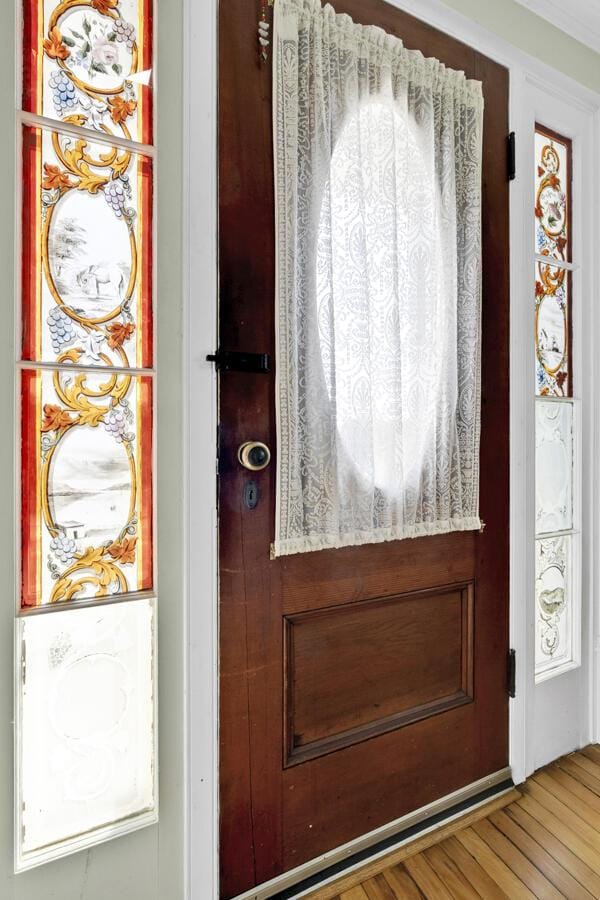 doorway to outside featuring wood finished floors