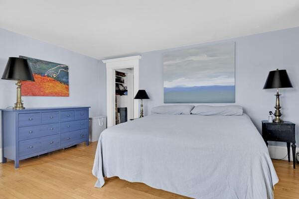 bedroom with light wood-style floors