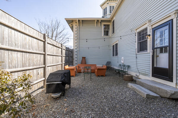 view of patio / terrace with area for grilling and fence