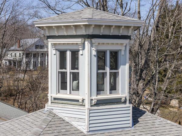 details featuring a shingled roof