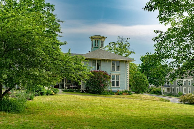 exterior space with a front yard