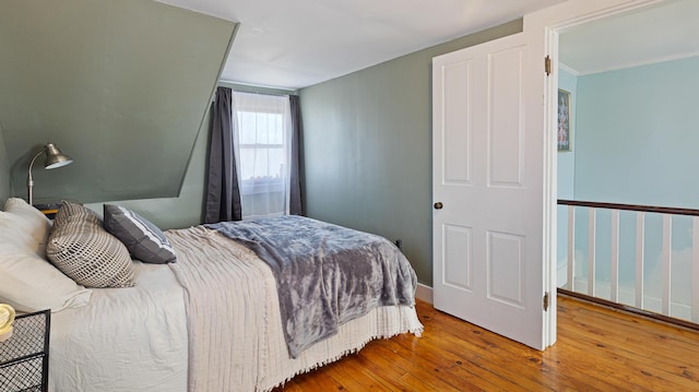 4 Burgess Rd, Guilford, ME 04443 - bedroom with baseboards and hardwood / wood-style flooring