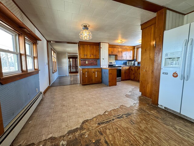 201 Mcburnie Rd, Presque Isle, ME 04769 - kitchen with baseboard heating, wallpapered walls, white fridge with ice dispenser, brown cabinetry, and stainless steel electric stove