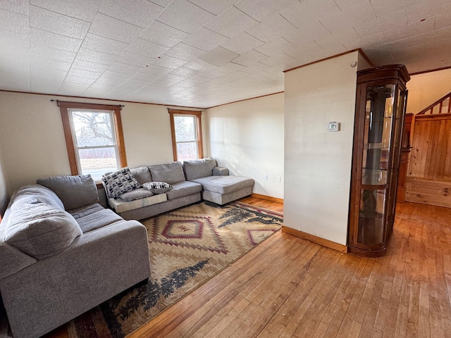201 Mcburnie Rd, Presque Isle, ME 04769 - living area with crown molding, baseboards, and hardwood / wood-style floors
