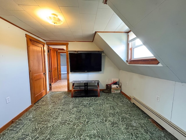 201 Mcburnie Rd, Presque Isle, ME 04769 - bonus room featuring a baseboard heating unit, baseboards, and lofted ceiling