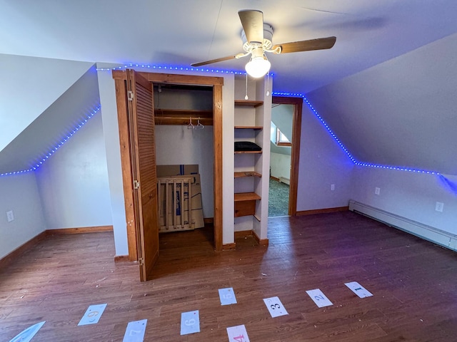 201 Mcburnie Rd, Presque Isle, ME 04769 - additional living space featuring baseboards, vaulted ceiling, wood finished floors, and ceiling fan