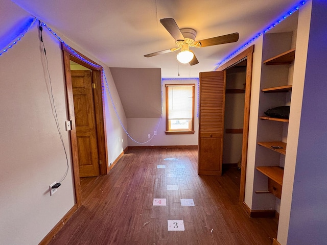 201 Mcburnie Rd, Presque Isle, ME 04769 - additional living space with dark wood-style flooring, baseboards, and ceiling fan