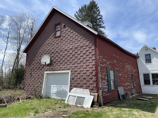 view of side of property featuring a chimney