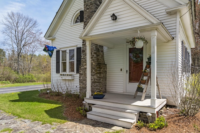 294 E Pond Rd, Jefferson, ME 04348 - view of front of house featuring a chimney and stone siding