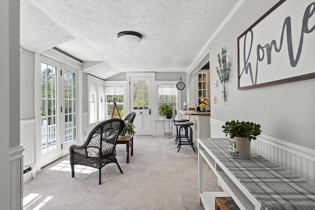 294 E Pond Rd, Jefferson, ME 04348 - sunroom with plenty of natural light, french doors, and a baseboard radiator