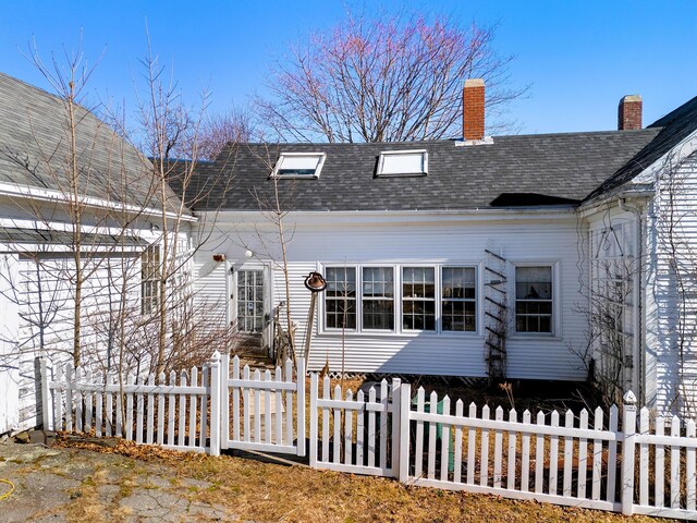 795 Bremen Rd, Waldoboro, ME 04572 - view of front of property with a shingled roof and a fenced front yard