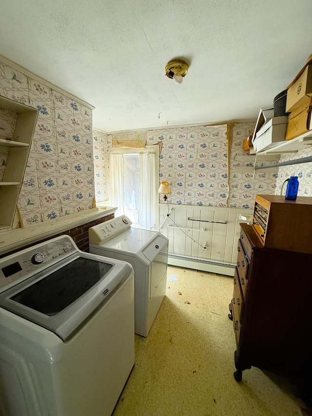 795 Bremen Rd, Waldoboro, ME 04572 - laundry room with a textured ceiling, washing machine and clothes dryer, wallpapered walls, a baseboard radiator, and laundry area