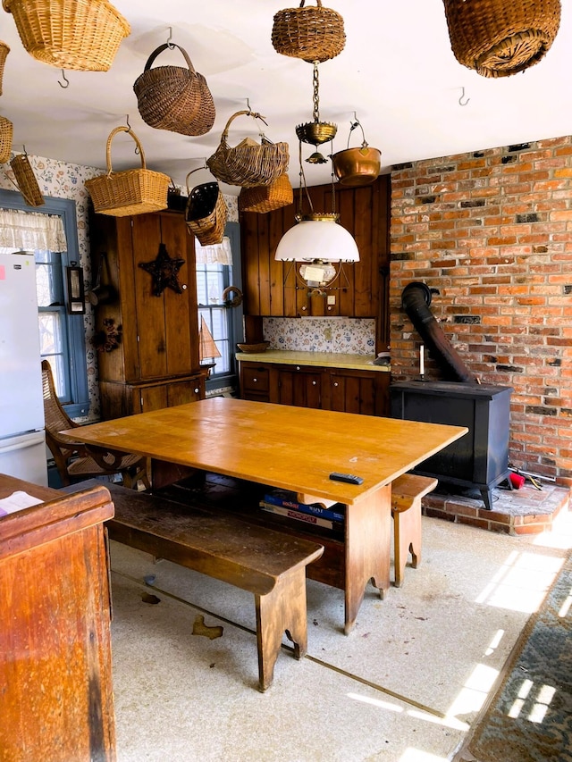 795 Bremen Rd, Waldoboro, ME 04572 - unfurnished dining area with a wood stove