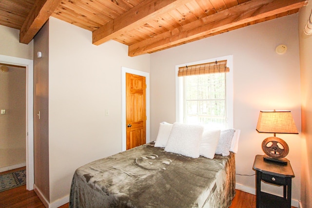 4 Bobs Way, Bethel, ME 04217 - bedroom with wood ceiling, wood finished floors, beam ceiling, and baseboards