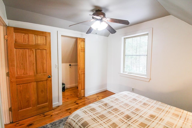 4 Bobs Way, Bethel, ME 04217 - unfurnished bedroom with light wood-type flooring, lofted ceiling, a closet, baseboards, and ceiling fan