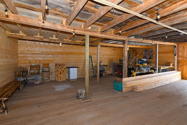 257 S Rumford Rd, Rumford, ME 04276 - below grade area featuring wood walls and hardwood / wood-style flooring