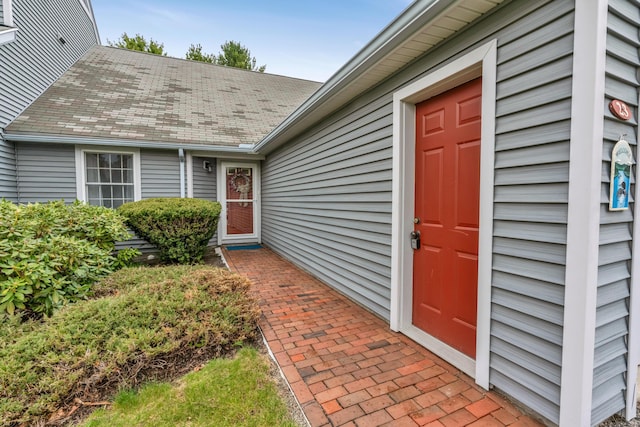 23 Winterberry Ct Unit 23, Cumberland, ME 04021 - doorway to property featuring roof with shingles