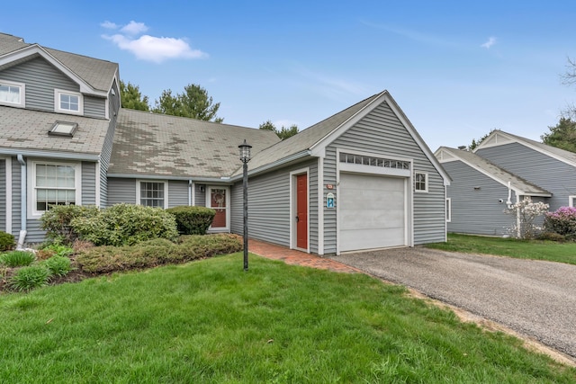 23 Winterberry Ct Unit 23, Cumberland, ME 04021 - ranch-style house with a front yard, a garage, and aphalt driveway
