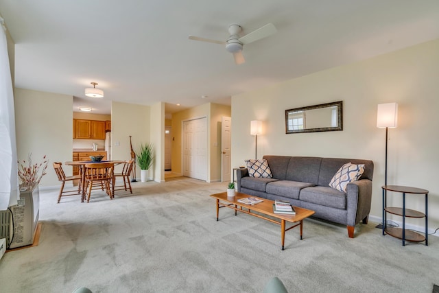 23 Winterberry Ct Unit 23, Cumberland, ME 04021 - living room with a ceiling fan, light carpet, and baseboards