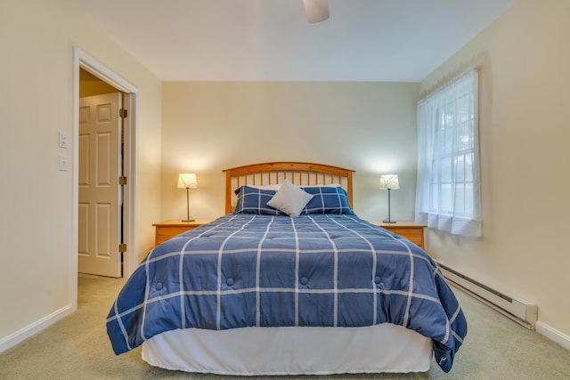 23 Winterberry Ct Unit 23, Cumberland, ME 04021 - carpeted bedroom featuring baseboards, a baseboard radiator, and ceiling fan