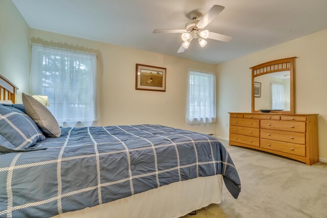 23 Winterberry Ct Unit 23, Cumberland, ME 04021 - carpeted bedroom featuring baseboards and a ceiling fan