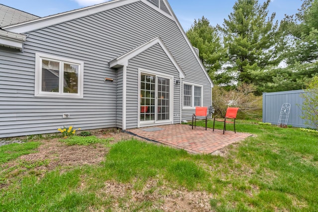 23 Winterberry Ct Unit 23, Cumberland, ME 04021 - rear view of property featuring a patio and a lawn