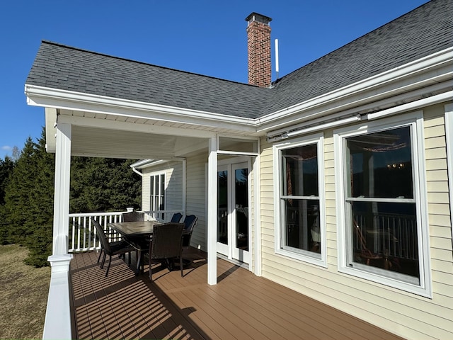 1379 Sly Brook Rd, Eagle Lake, ME 04739 - wooden deck with french doors and outdoor dining space