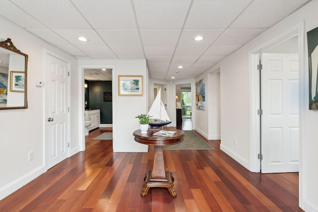 1081 Kings Hwy, Kennebunkport, ME 04046 - hallway with wood finished floors, a drop ceiling, recessed lighting, and baseboards
